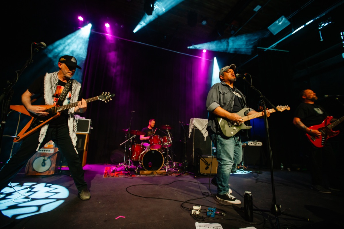 OP-ED performing live on stage