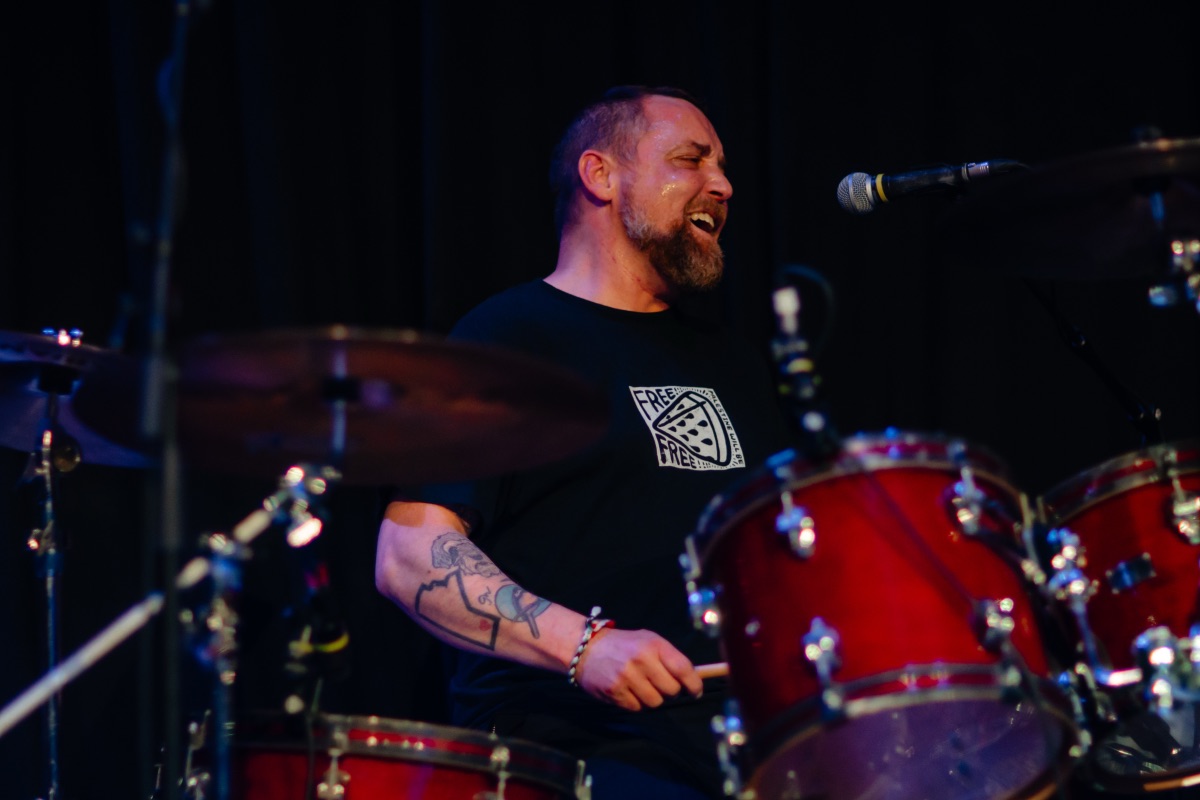 Drummer performing live